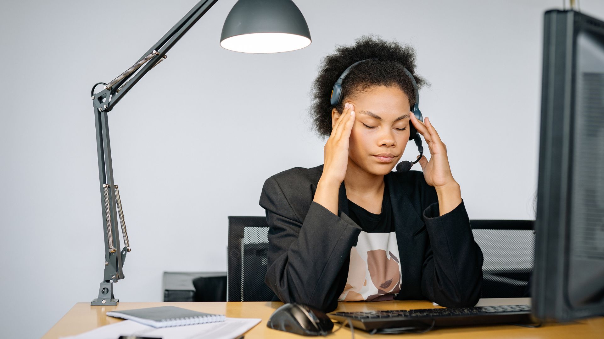 woman experiencing prolonged stress at work