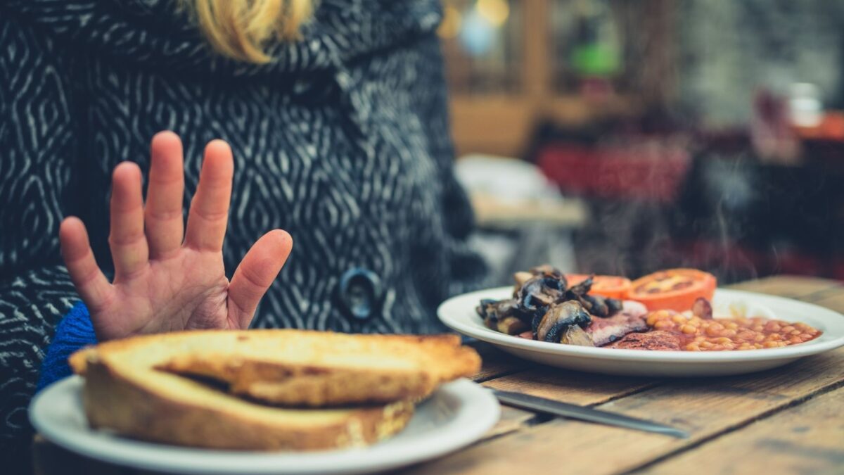 woman refusing bread